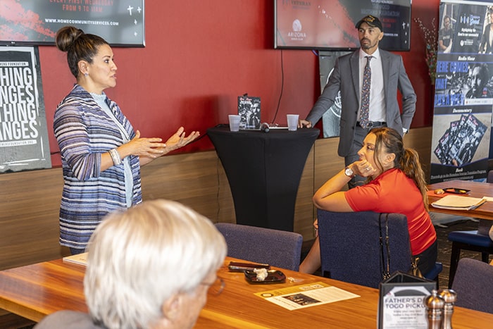 An event photo of a networking event at the Arizona Sands Club.
