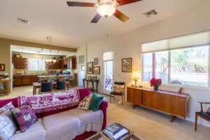 A real estate photo of a furnished living room.